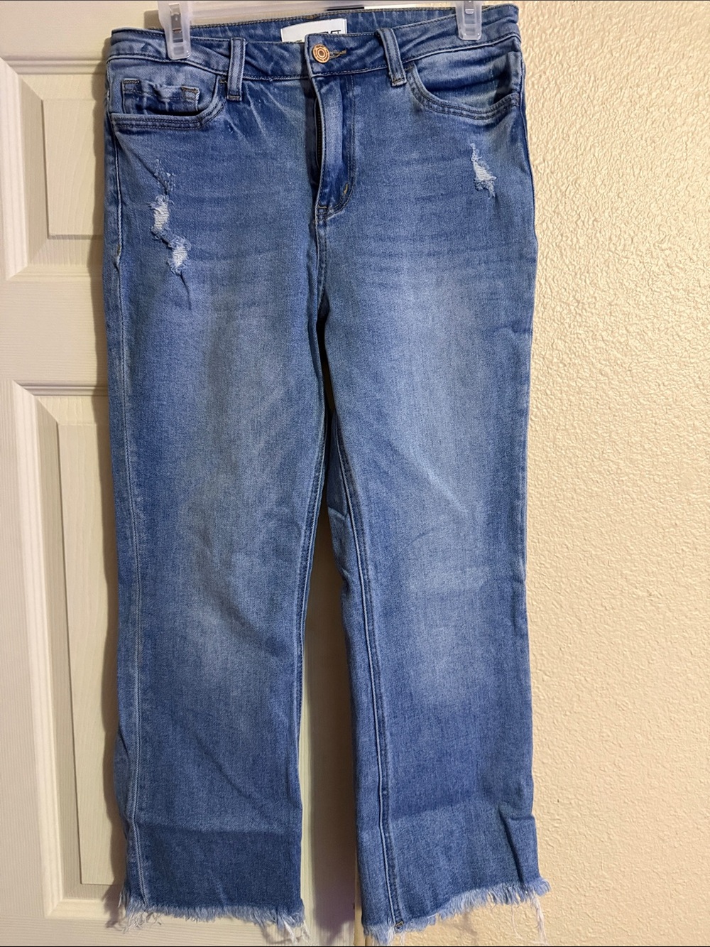 Classic Medium Blue Straight-Leg Jeans with Subtle Distressing